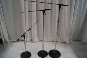 Lot Standard Black Mic Stand Kits Includes (12) Short Mic Stands w/ Boom, (12) Regular Mic Stands w/ Boom, (2) Tall Heavy Mic Stands w/ Long Boom, (24) Regular Round Bases, (2) Heavy Round Bases)