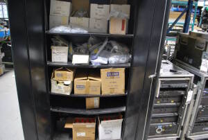 Black Cabinet containing Neutrik/Powercon Connectors, Various Sized Uline Reclosable Bags, (8) Flux Off Can, (6) Electro Wash Can and (2) Canada Proof Lead Acid Battery