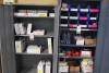 Cabinet with Assorted First Aid Kits and Cabinet with Miscellaneous First Aid Supplies
