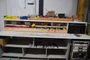 Workbench containing an Assortment of Tools, Rolling Toolbox, Hardware and Panasonic Radio